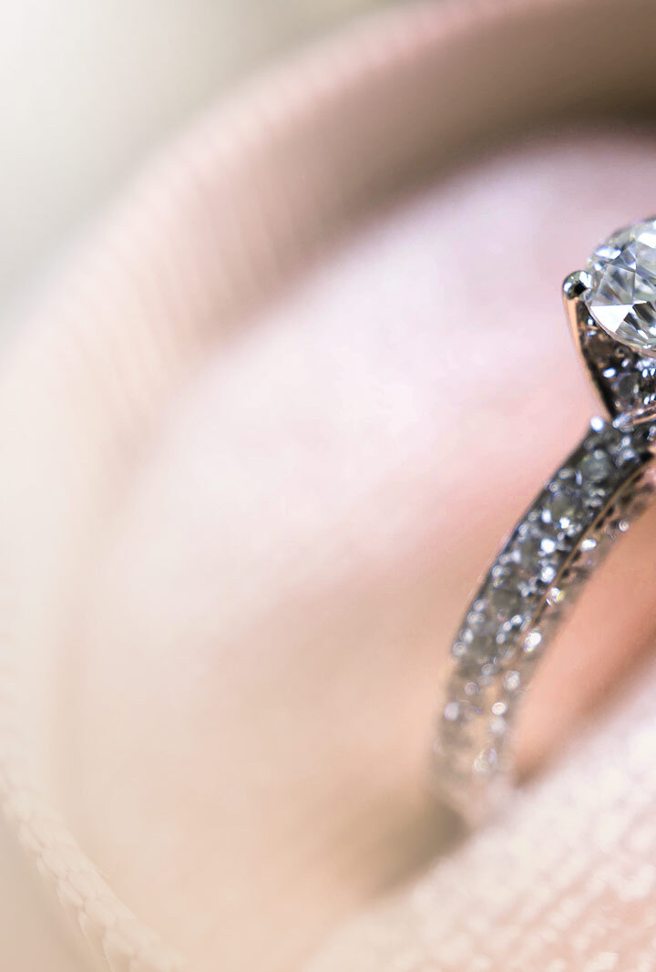the edge of a diamond engagement ring