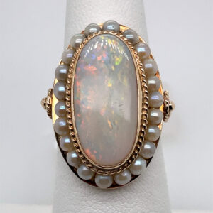 Opal and Pearl Halo Ring in Yellow Gold